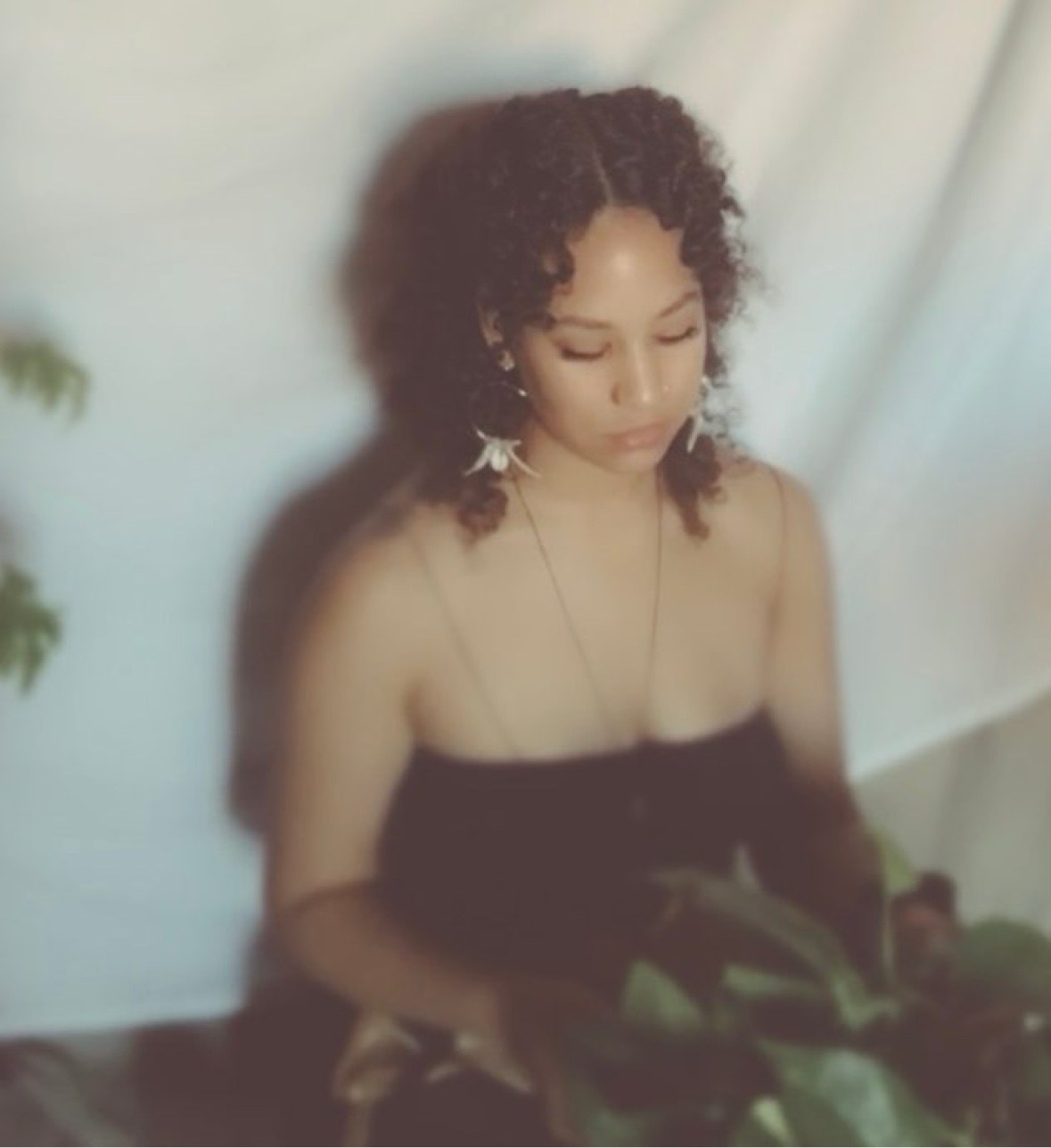 Elexix, the maker behind XiX Meadows, in soft natural light