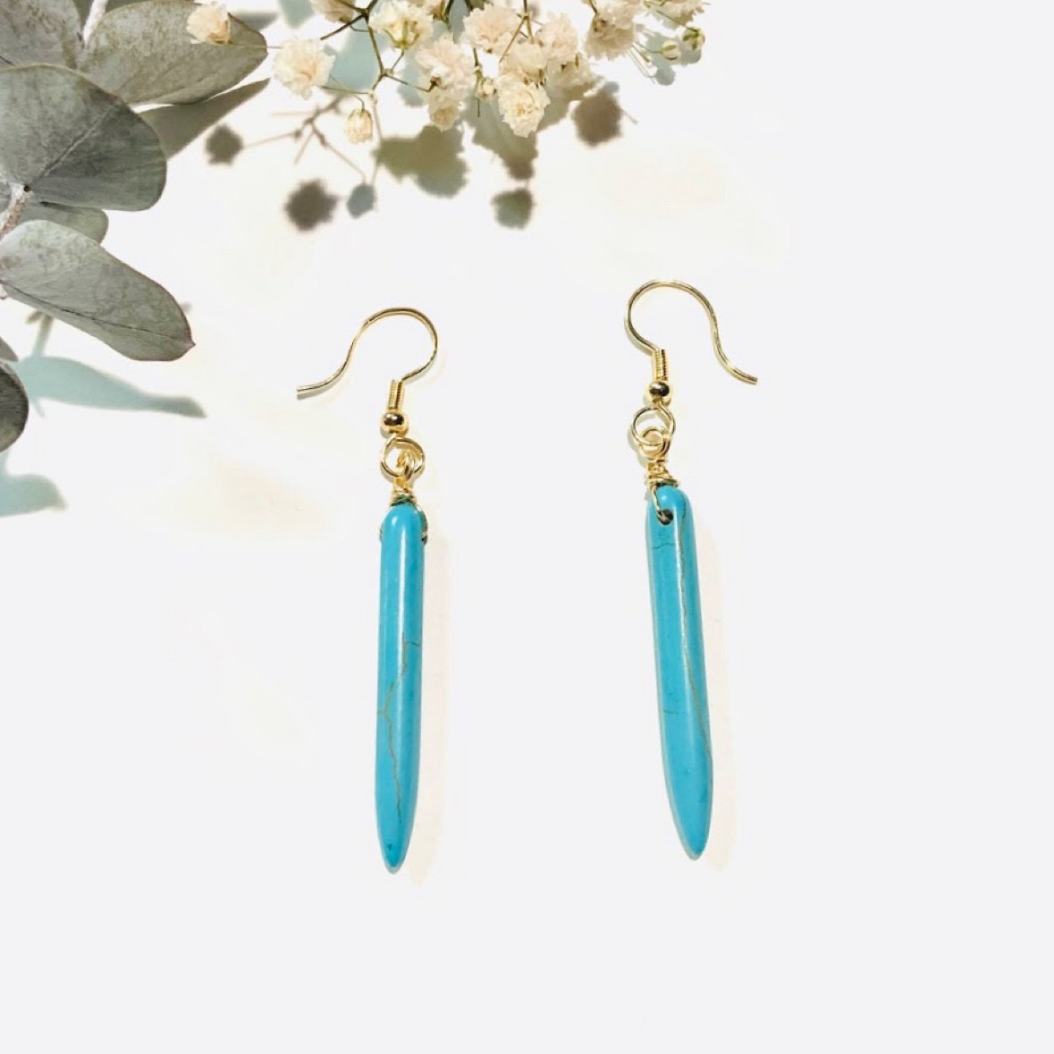Turquoise spike drop earrings on gold hooks