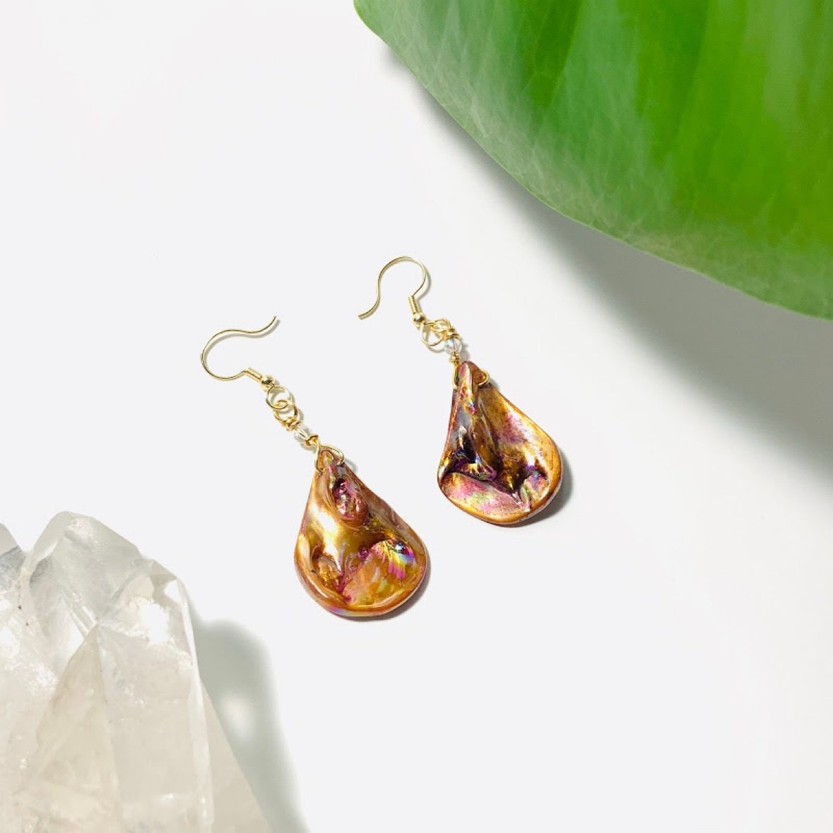 Iridescent shell drop earrings on gold hooks
